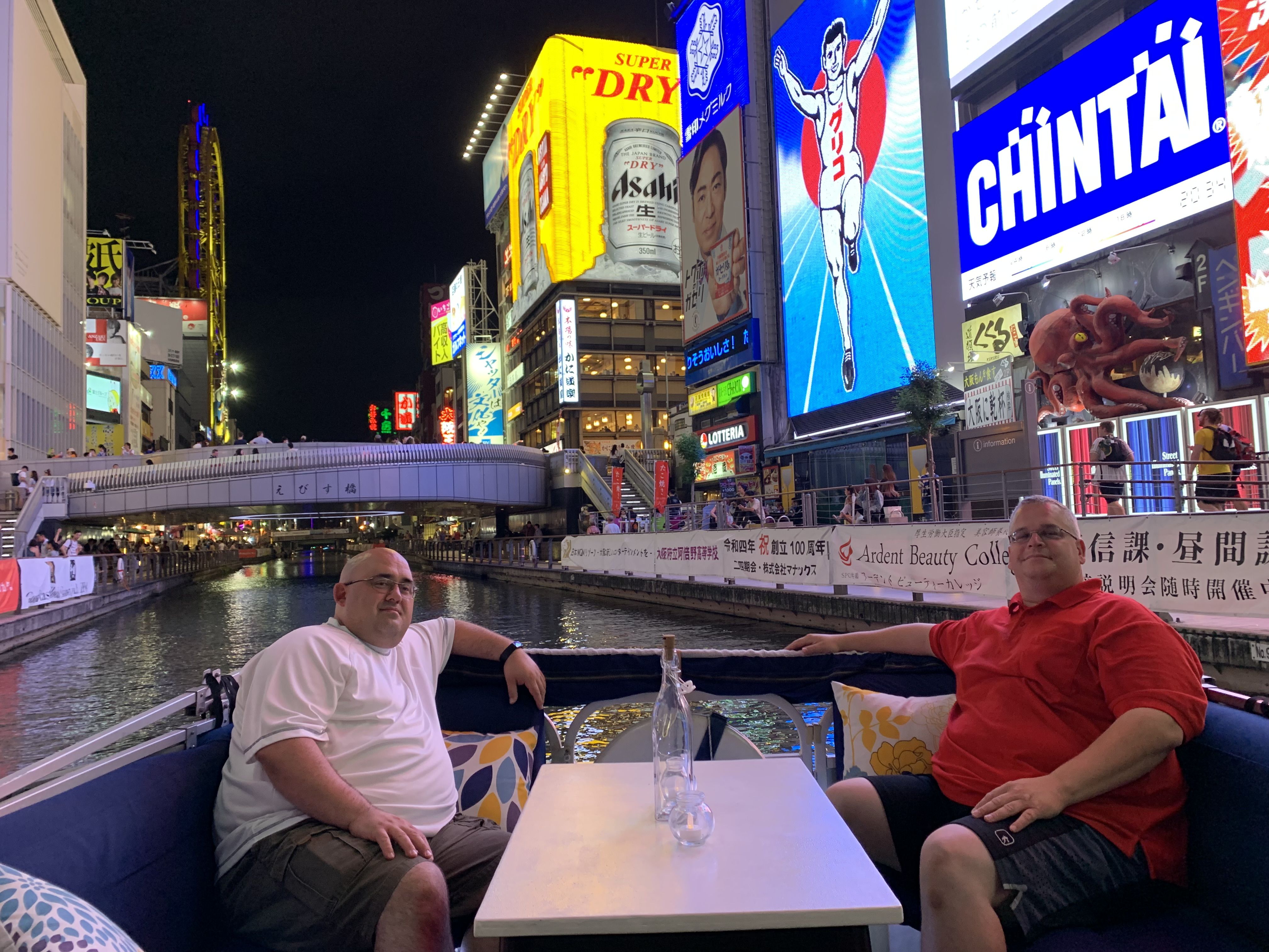 Dotonbori Sightseeing Cruise Enjoy a 20-minute ride with views of the Glico sign and lively downtown scenes from the water (Departs and returns at Minatomachi Pier)